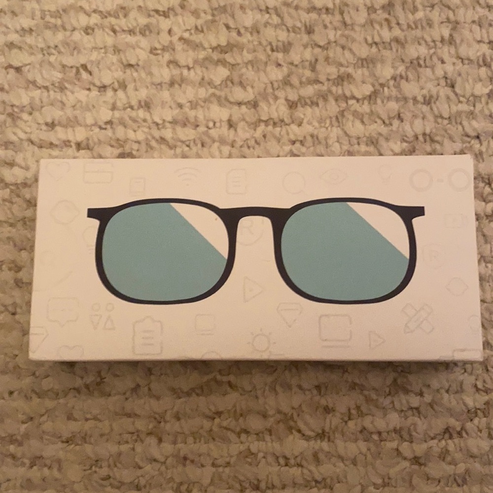 Brand new blue light glasses with cute elephant case.